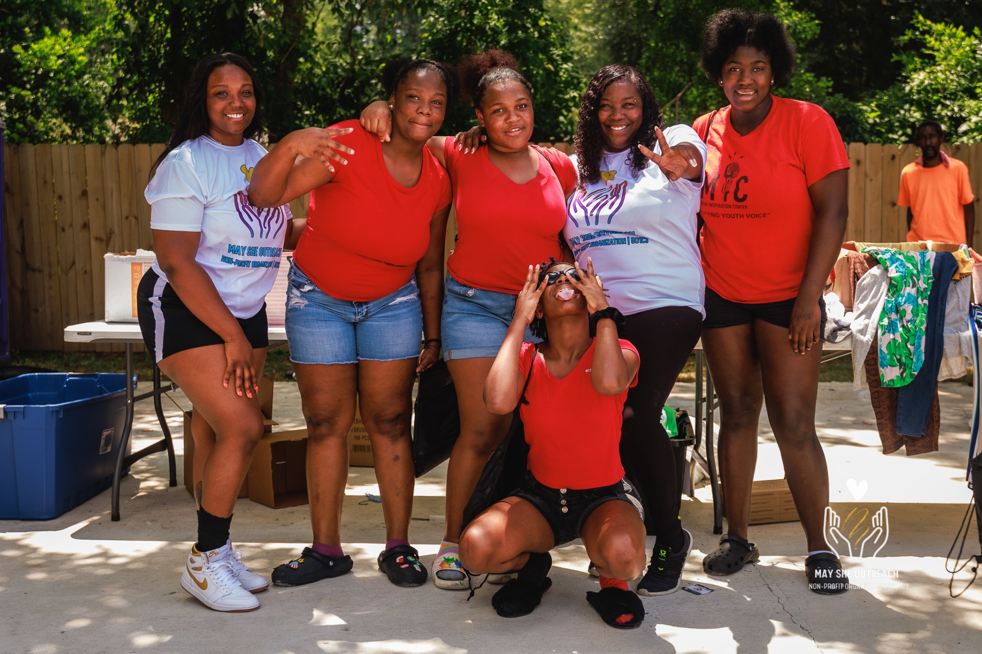 May She Outreach volunteer team at a community event